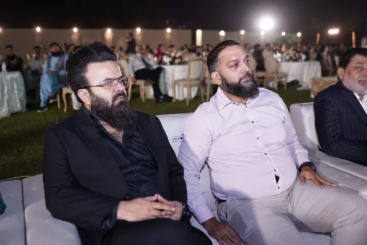 Council representatives seated among the invited guests.